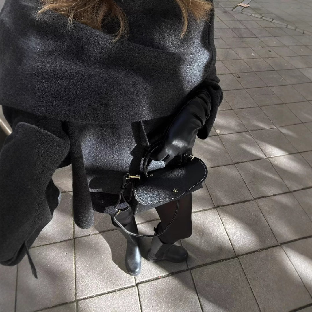Ella women's chic winter poncho, offering effortless warmth & elegant layering style.
