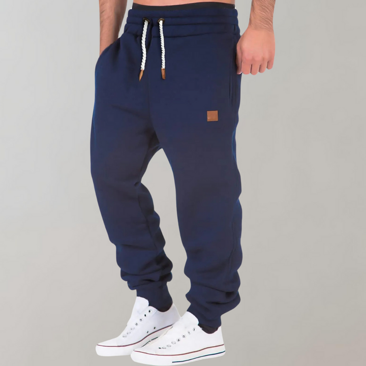 Men's relaxed fit jogging pants in a modern, comfortable style, perfect for casual wear.