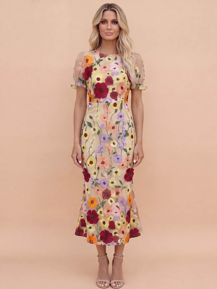 Elegant women's beige midi dress with floral applique, perfect for wedding guests & parties.