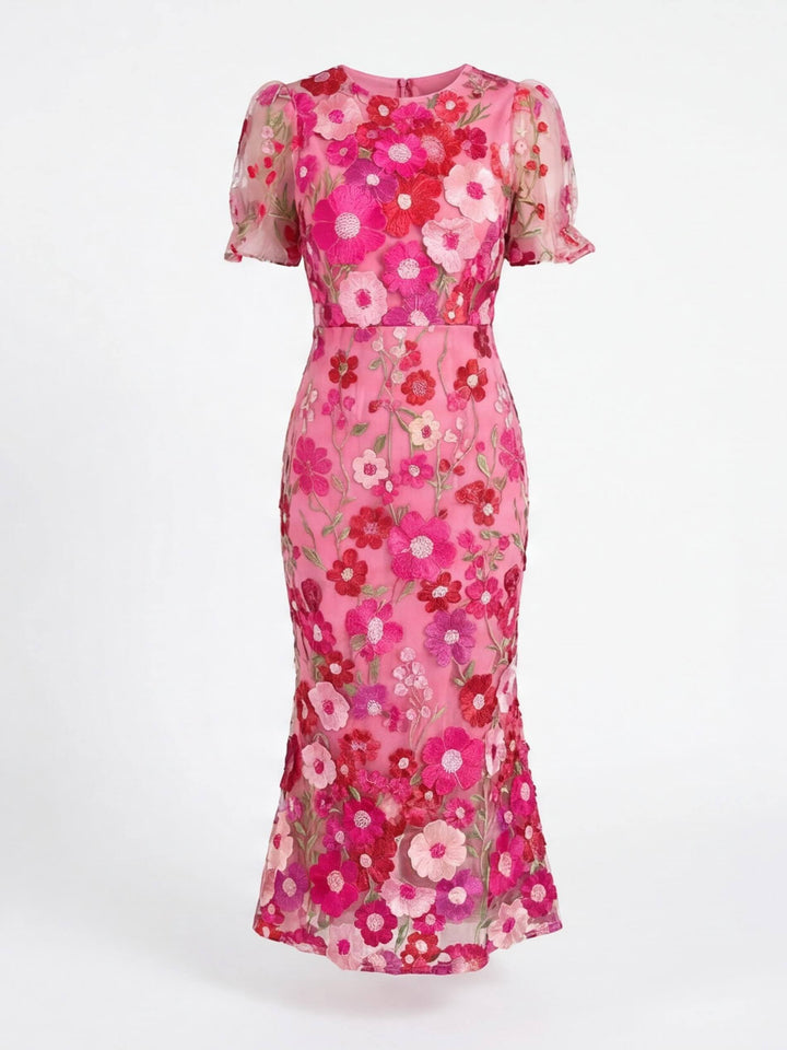 Beautiful women's pink floral applique midi dress, embodying spring elegance & summer style.