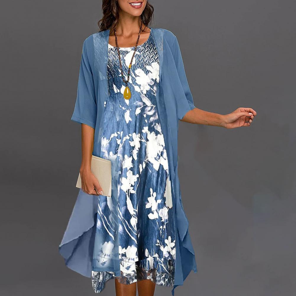 Floral summer dress with elastic waist and coordinating cardigan. Stylish two-piece outfit for women, great for daywear.