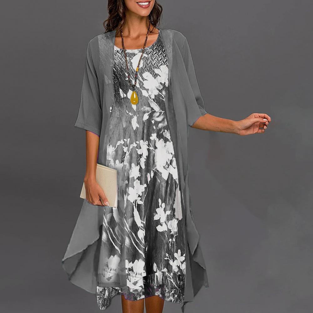 Chic women's floral summer dress & light cardigan set. Ideal elegant daywear or special occasion outfit with elastic waist.