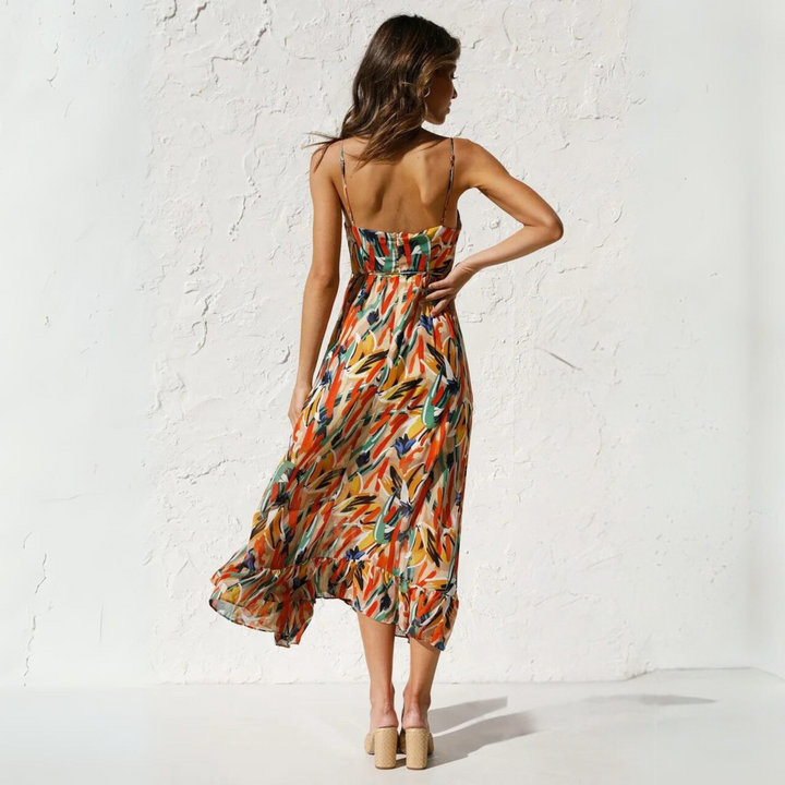 Women's casual V-neck printed backless midi dress, an elegant choice for summer outings & vacation fashion.