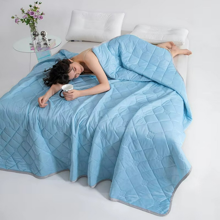 Soft summer cooling quilt ensures maximum comfort and breathability for a peaceful sleep experience.