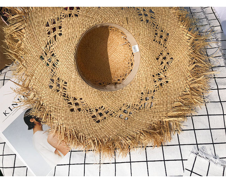 Chic women's Celine floppy Panama straw hat, perfect for summer sun protection & travel.