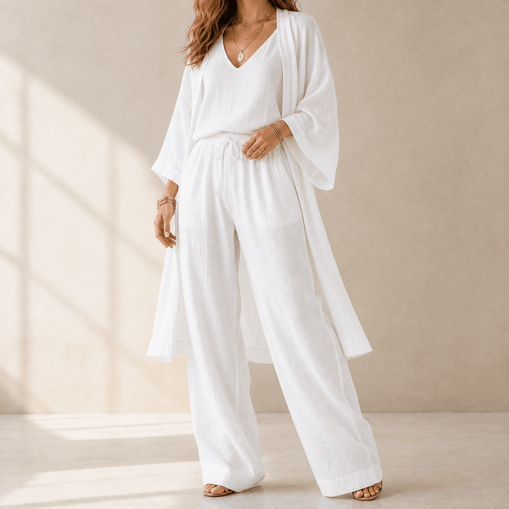 Stylish women's 3-piece loungewear ensemble featuring wide leg pants, duster cardigan, and cami.