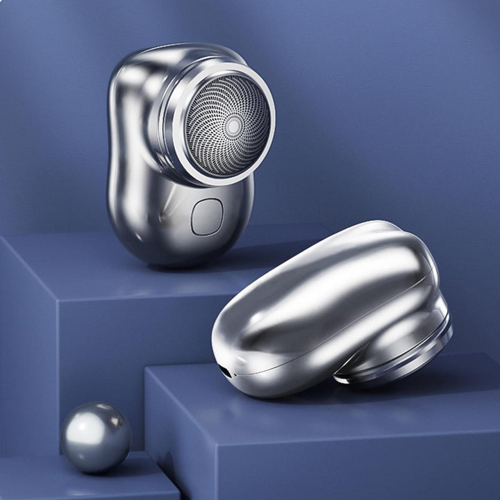 Men's waterproof electric rotary shaver shown in use. Cordless design, rechargeable for a smooth wet/dry shave.