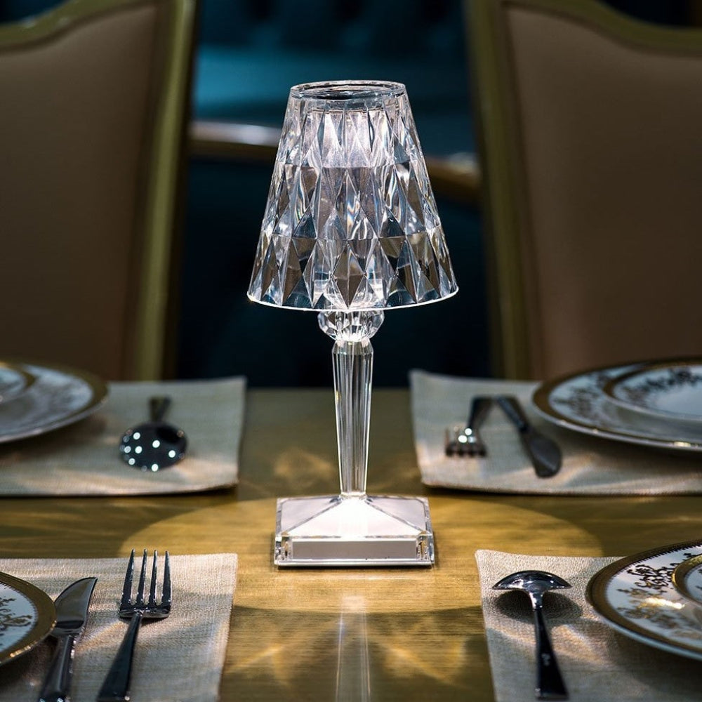 Stunning crystal table lamp with soft LED light, touch control for adjustable brightness. Modern decor piece.