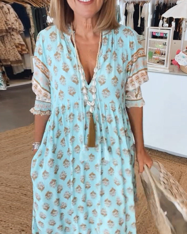 Relaxed fit women's boho print maxi dress, a chic summer v-neck short sleeve.