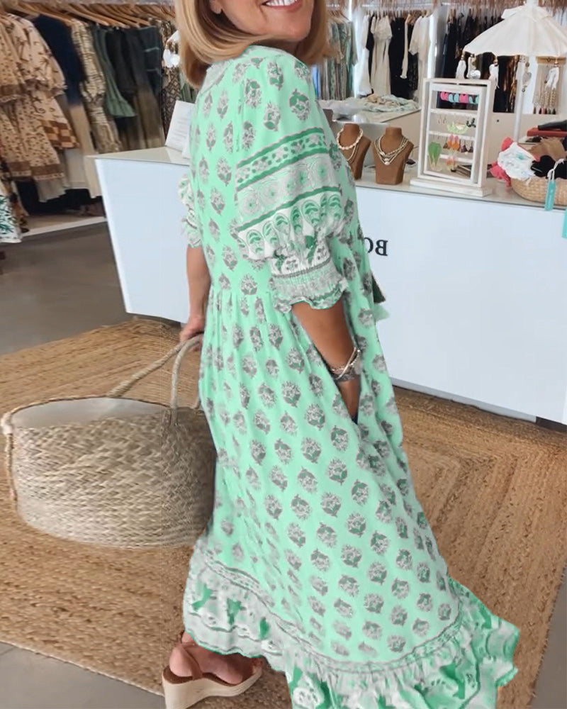 Flowy women's boho geometric print maxi dress, ideal summer beachwear & vacation style.