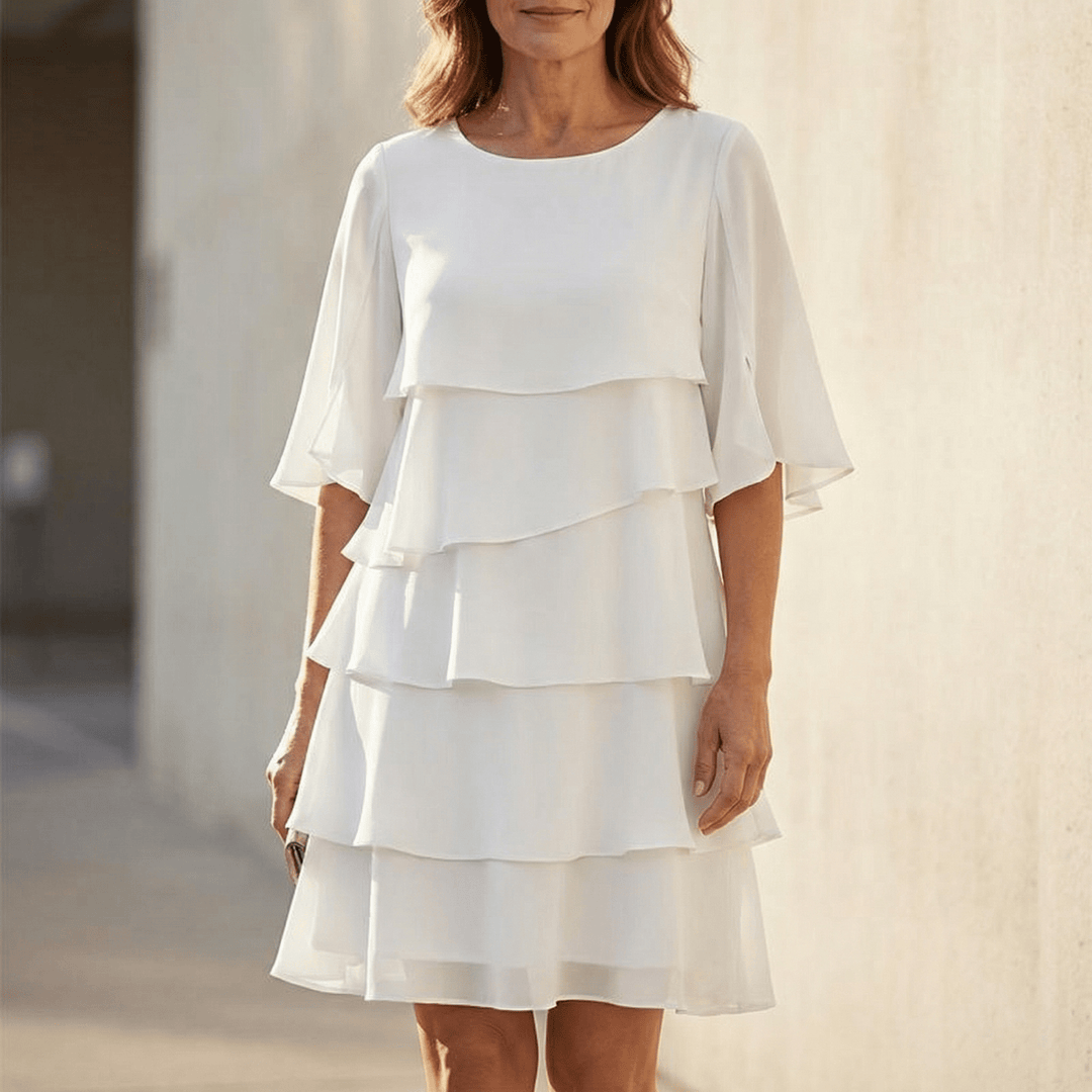 Elegant women's tiered ruffle midi dress for summer parties and casual wear.