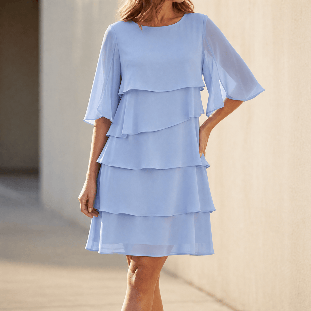Women's flattering tiered ruffle midi dress for spring and summer events.