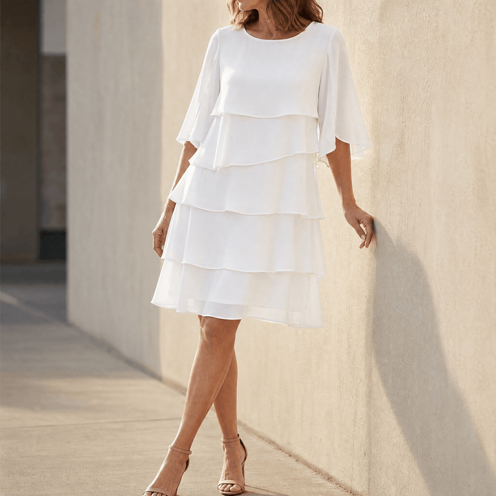 Flowy women's tiered ruffle midi dress, perfect for summer casual outings.