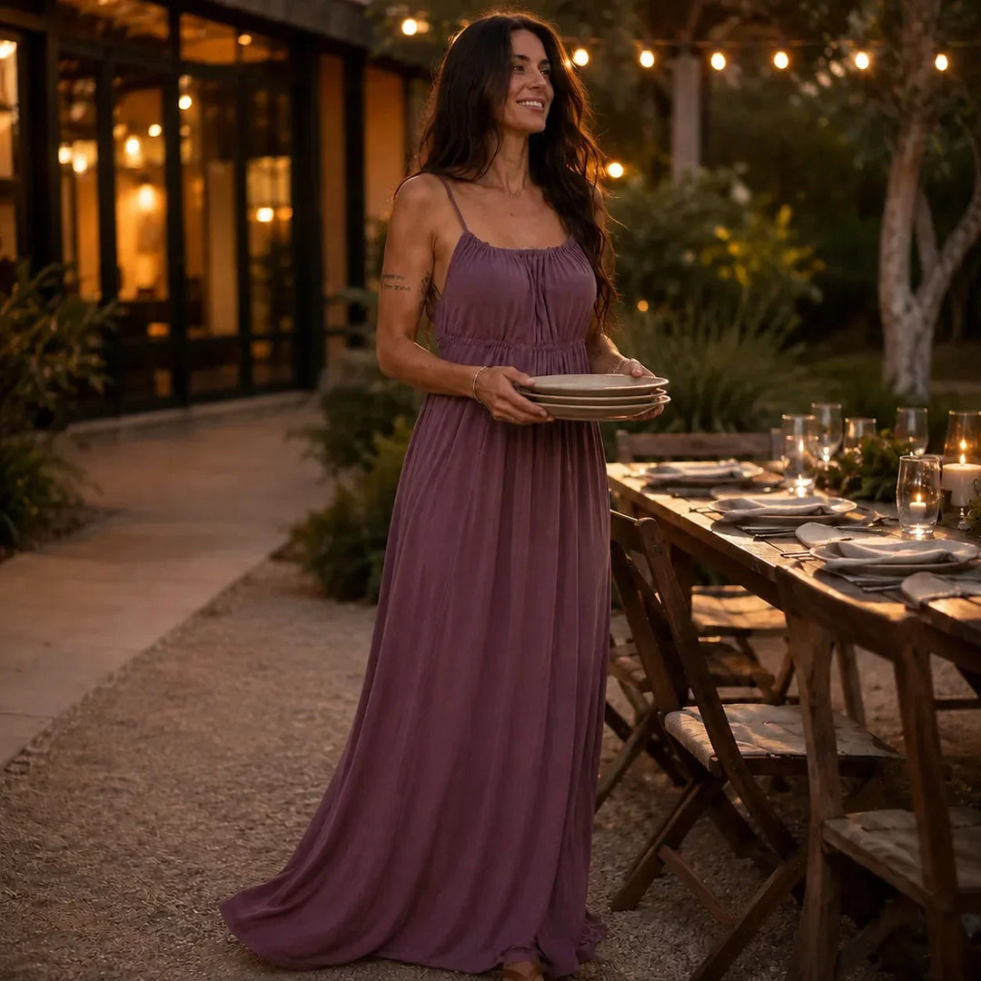 Women's Thalara vacation maxi dress, backless with adjustable tie-back and a fashionable side split.