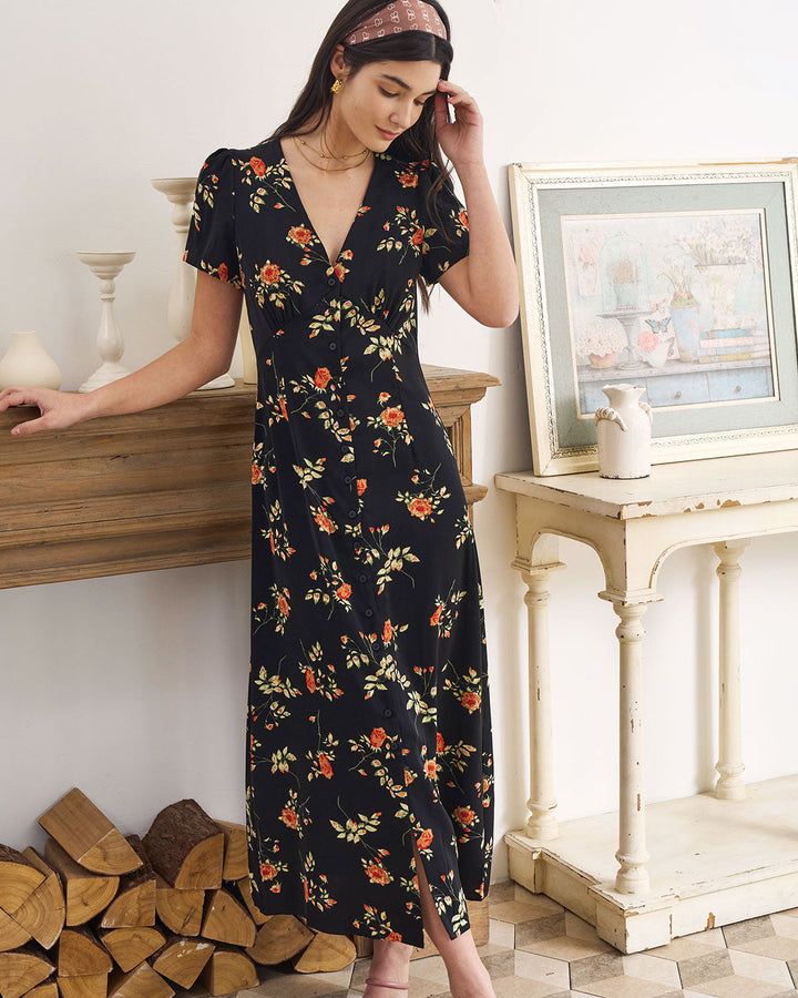 Women's short-sleeve V-neck maxi dress featuring a beautiful floral pattern. Great for summer elegant wear.