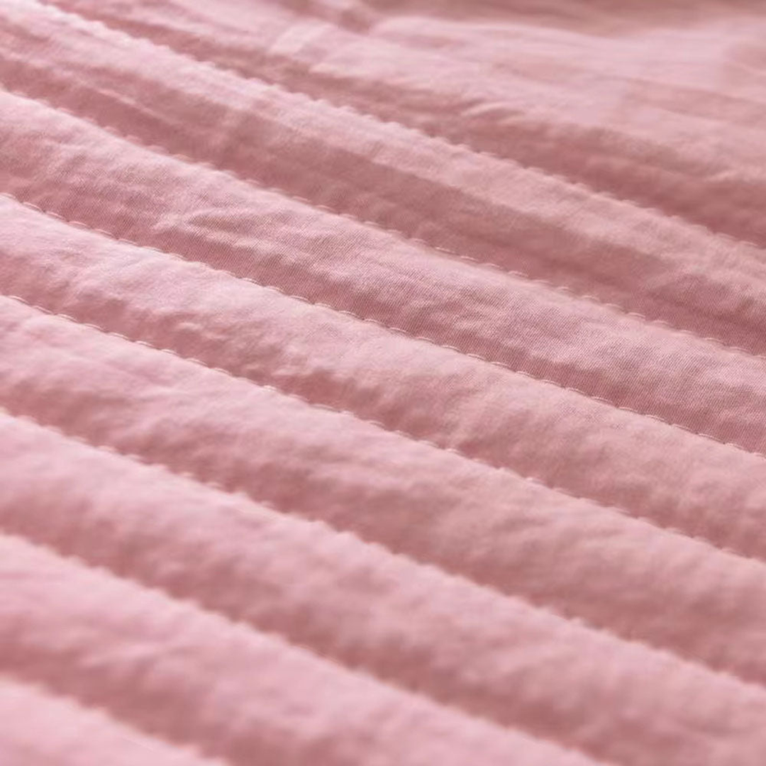 Lightweight, breathable cooling blanket for a serene, sweat-free sleep experience. Ideal for year-round use.