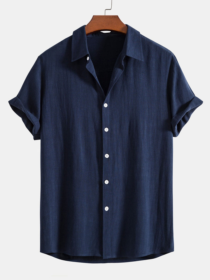 Stylish men's polished short sleeve shirt. Relaxed fit, button-down design for casual or smart casual summer fashion.