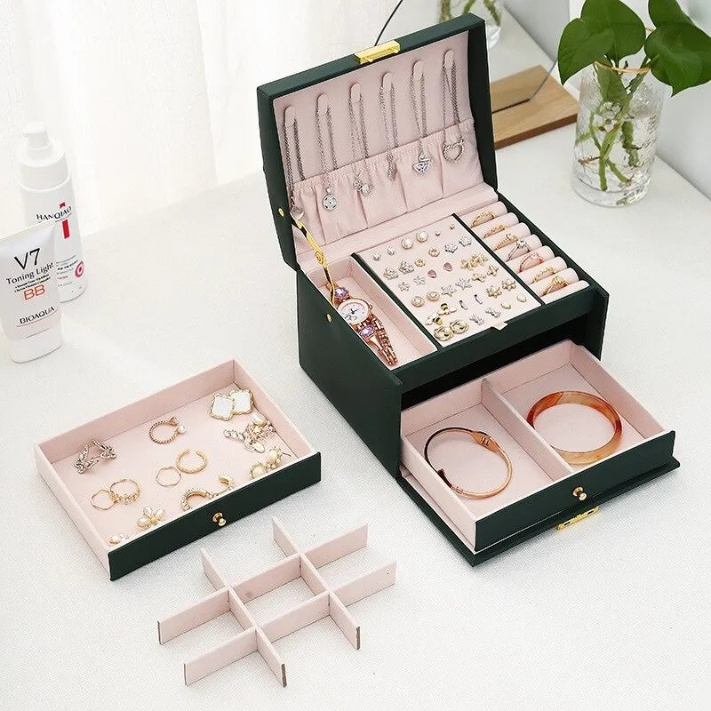 Organized multi-layer jewelry box for women, neatly storing necklaces, bracelets, rings, and earrings.