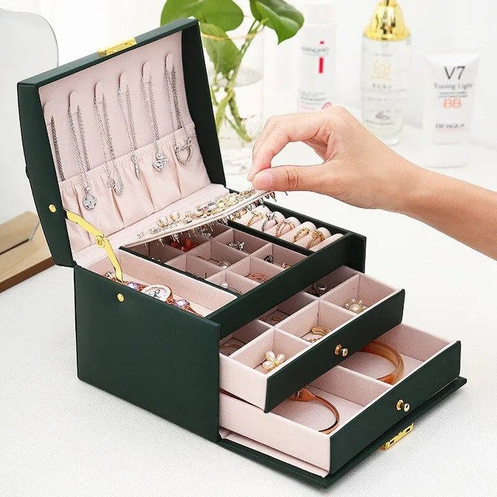 Premium three-layer jewelry storage box for women, offering elegant and organized keeping for all precious items.