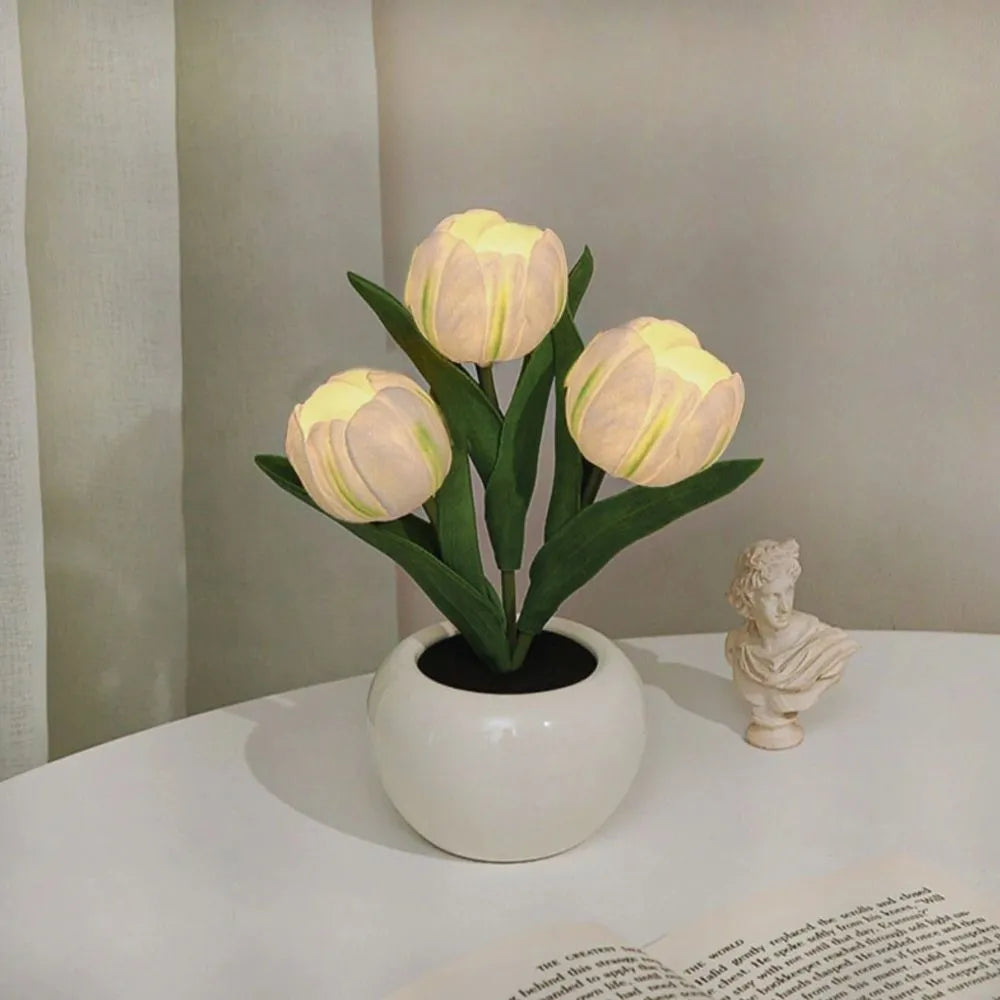 Close-up of a charming LED tulip night light, showcasing its gentle warm glow and detailed design.