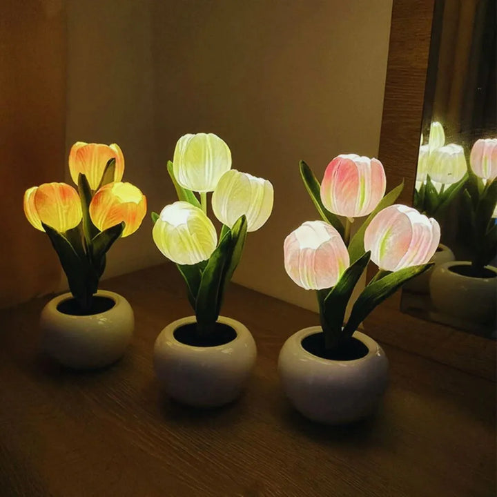 Charming tulip night light lamp with gentle warm LED glow for bedroom and home decor.
