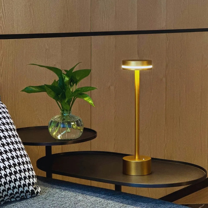Contemporary cordless LED table lamp, fully dimmable via touch, ideal for modern home decor.