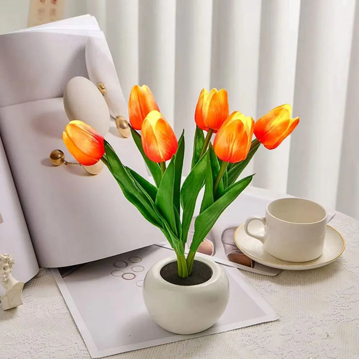 Energy-efficient LED tulip night light lamp emitting a gentle warm glow, great for ambient lighting.
