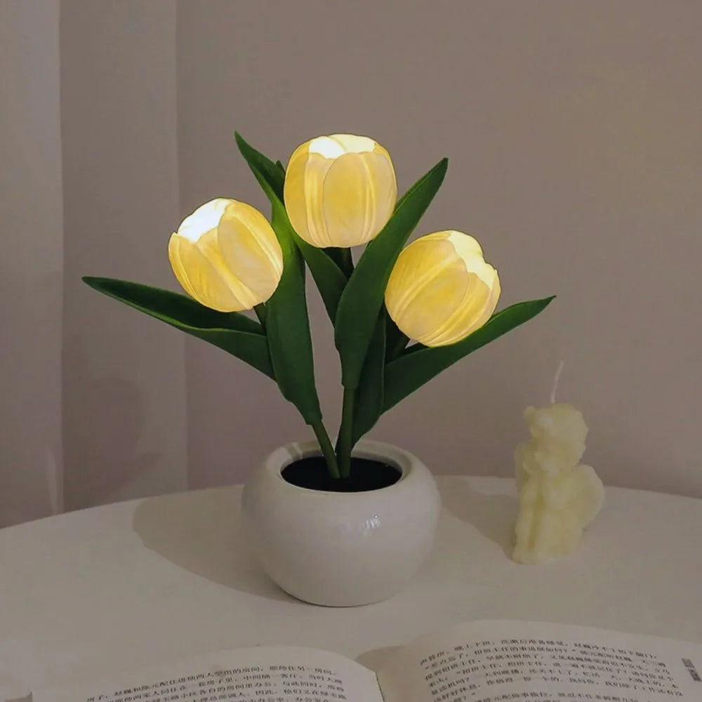 Minimalist tulip LED night light lamp with a warm glow, a subtle yet elegant piece of home decor.