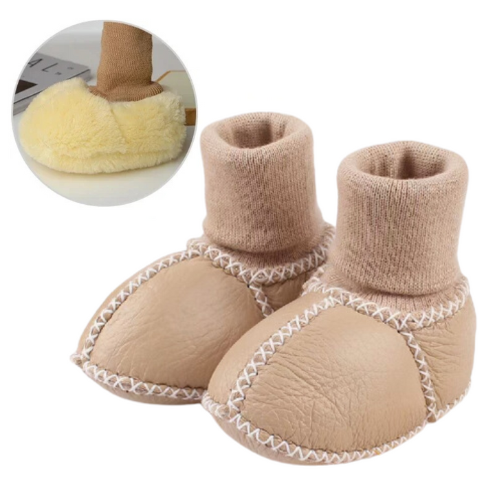 Close-up of non-slip sole on infant slippers, ensuring safe first steps for baby.