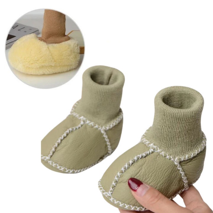 Cozy infant shoes with soft flexible sole, perfect slip-on footwear for nursery.