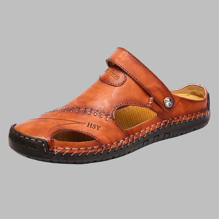 Stylish men's casual slides, black polished finish, ideal for beach, pool, or everyday summer footwear.