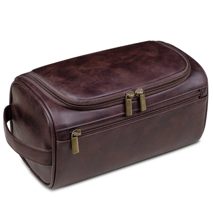 Durable unisex leather travel dopp kit & cosmetic organizer, ideal for sleek and compact travel packing.