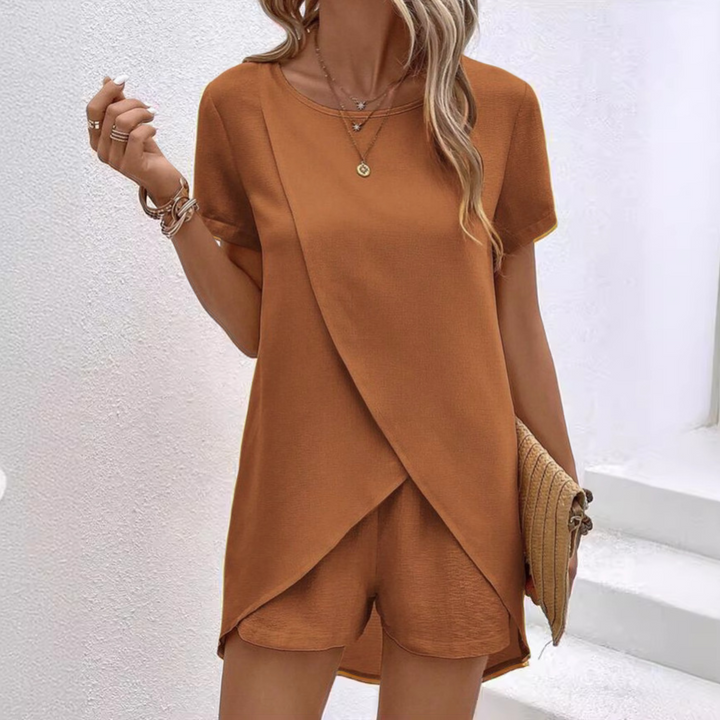 Elegant woman in a relaxed fit summer co-ord short sleeve top & shorts set, perfect for stylish everyday wear.