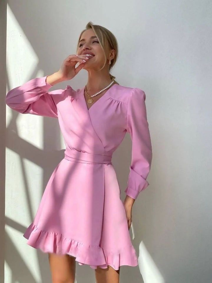 Flattering Livia A-line women's dress with stylish V-neck and long sleeves, versatile for any trendy occasion.