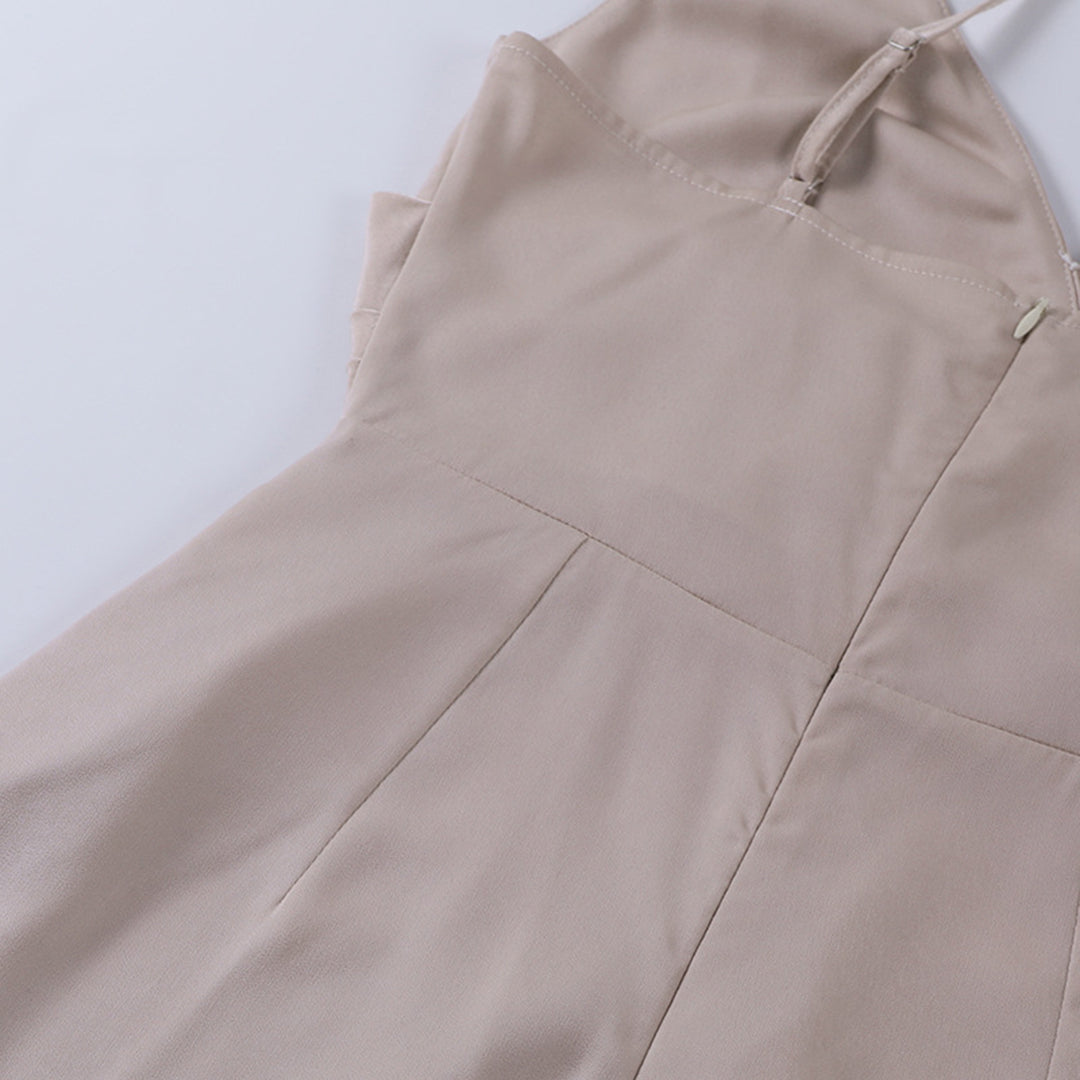 Elara women's elegant V-neck maxi dress with a sophisticated high slit, perfect for any chic summer occasion.