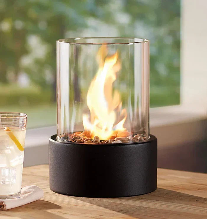 Modern steel glass tabletop fire pit, perfect for contemporary home & patio decor.