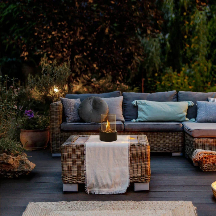 Cozy tabletop fire pit lantern, ideal for intimate indoor ambiance or romantic outdoor evenings.