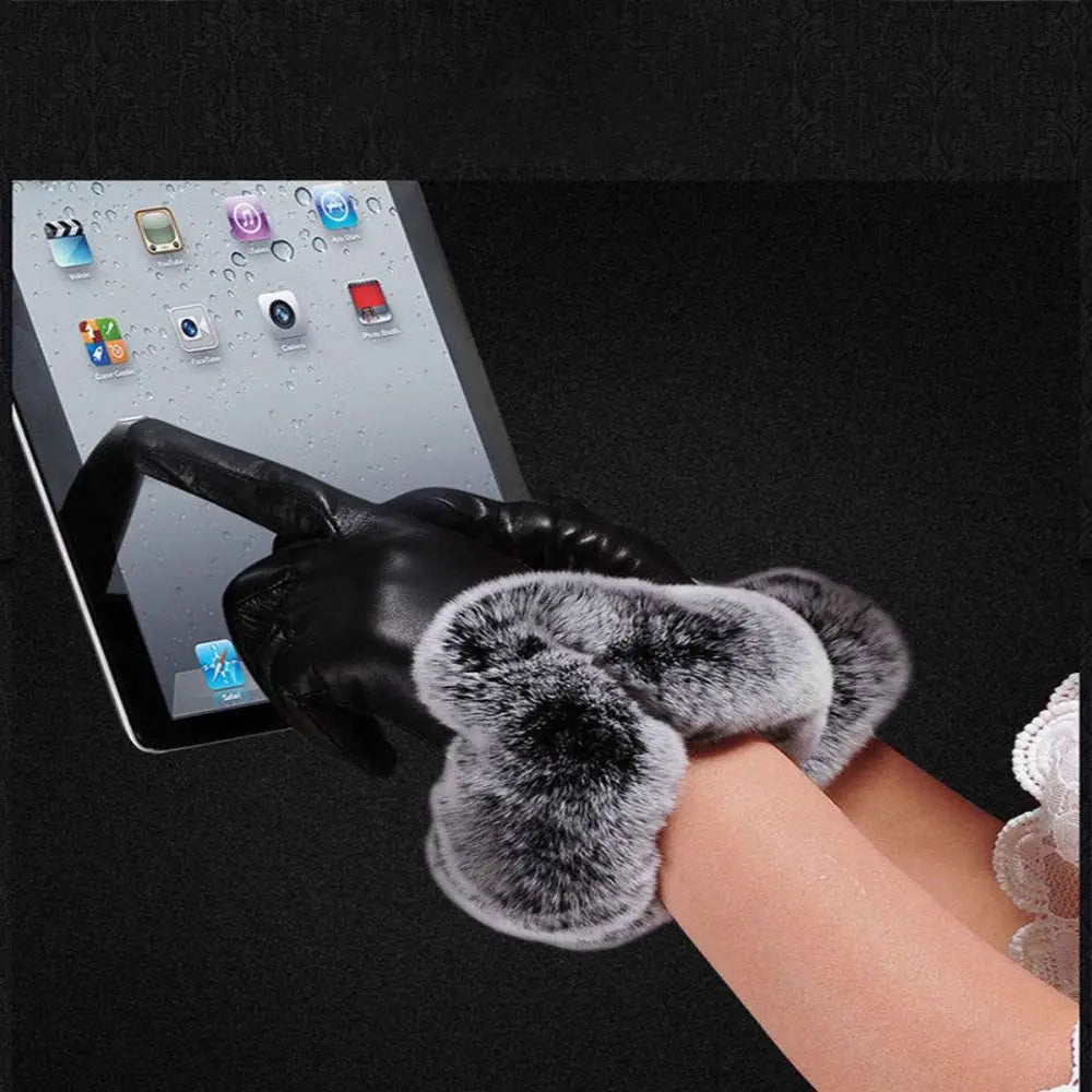 Fashionable PU leather winter gloves for women, an elegant accessory to keep hands warm in style.