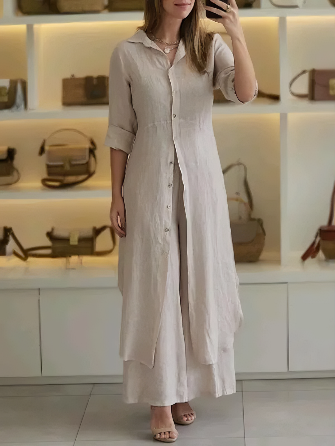 Elegant women's linen two-piece summer outfit. Stylish, comfortable, and loose-fit matching set for vacation.