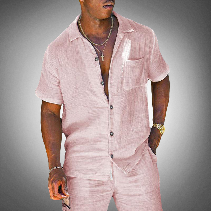 Pink men's two-piece casual set, comfortable and stylish. Modern leisure wear for summer fashion, matching outfit.