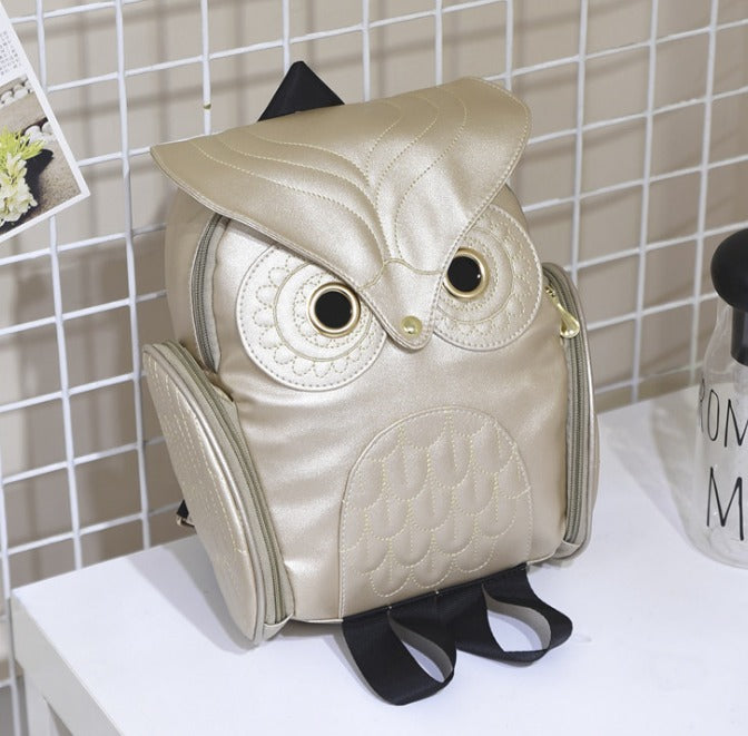 Cute owl print PU leather backpack for women. Multi-pocket casual bag, perfect gift for her or school use.