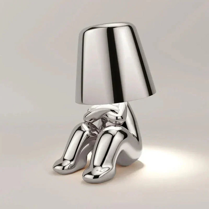 Sleek modern LED table lamp, rechargeable, dimmable, for atmospheric lighting.