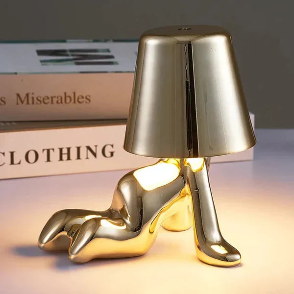 Atmospheric LED table lamp, modern design, rechargeable with adjustable brightness.