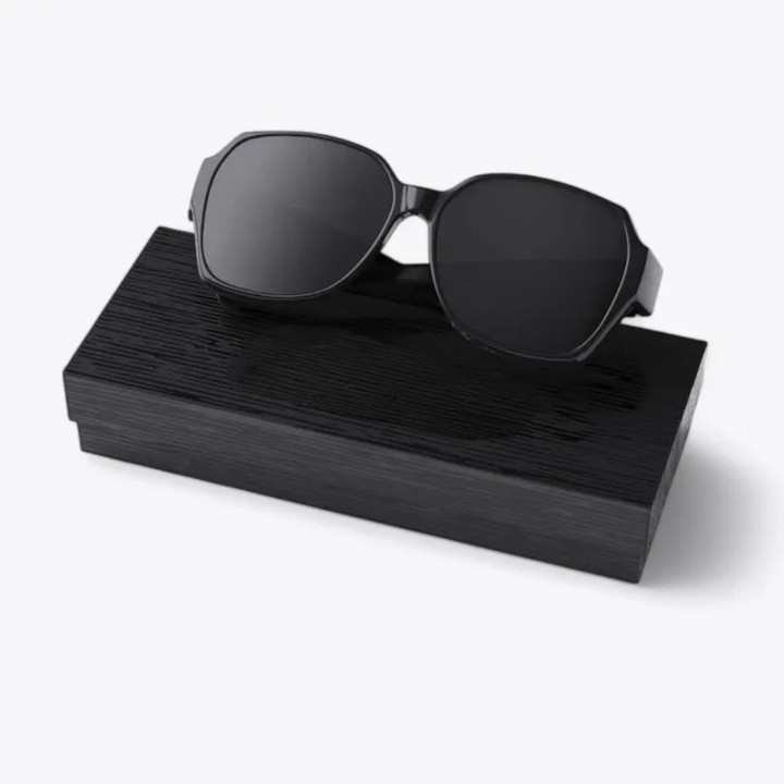 Comfortable over-glasses polarized sunglasses for men & women, enhancing vision & glare protection while driving.