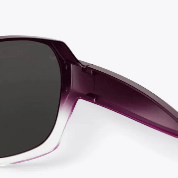 Unisex polarized sunglasses to wear over prescription glasses, providing UV protection & anti-glare comfort.