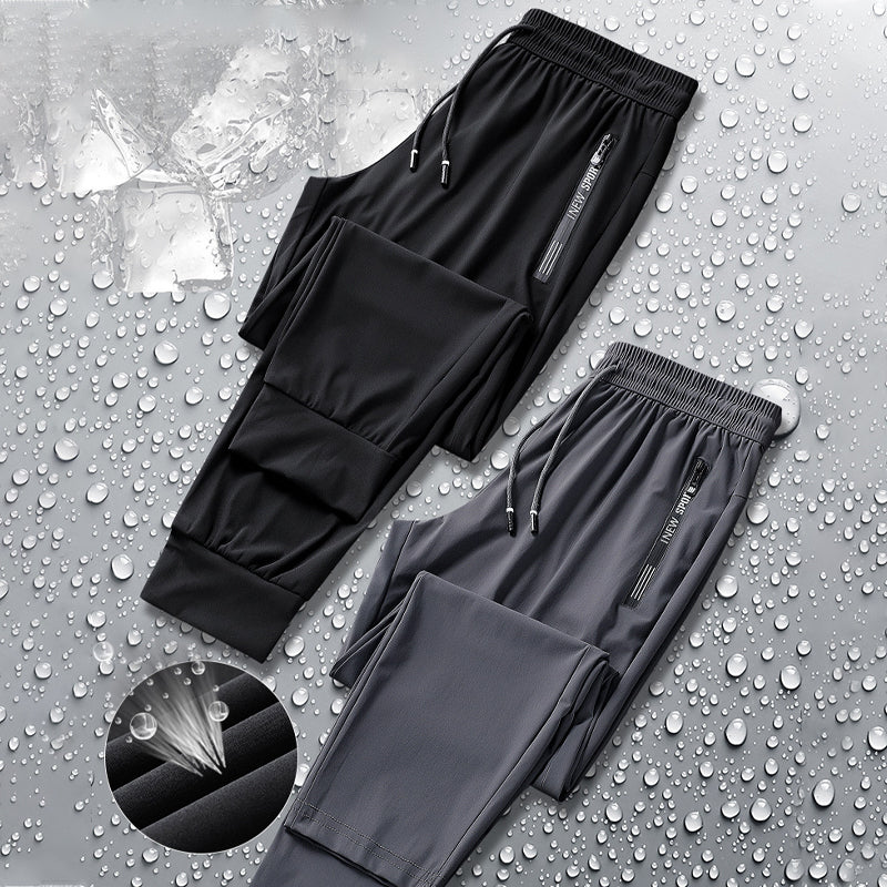 Gray unisex outdoor pants, quick-dry and stretchable for active pursuits.