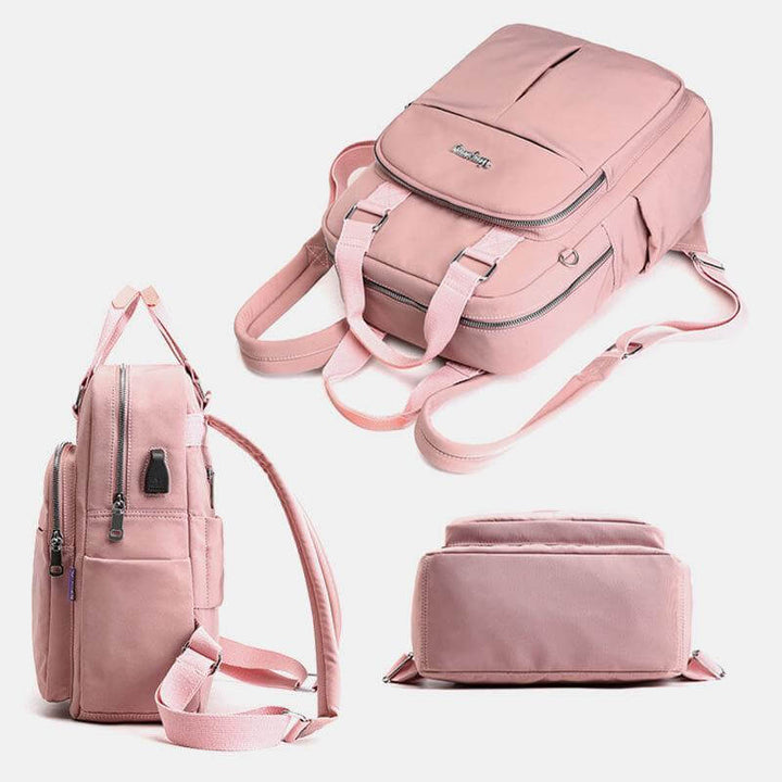 Ergonomic waterproof backpack for men & women, with USB charging, perfect as a school, work or travel bag.