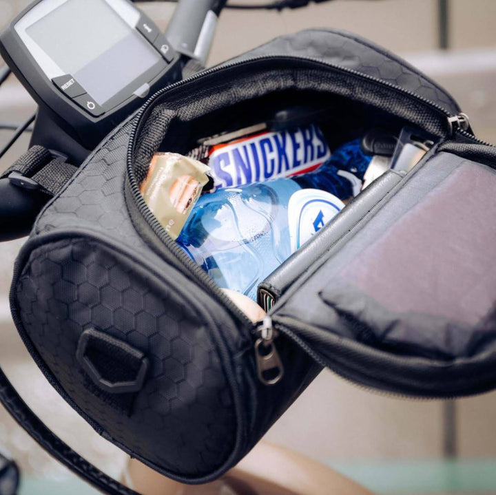 Compact waterproof bike phone bag, fits handlebars, for easy navigation and secure outdoor storage.
