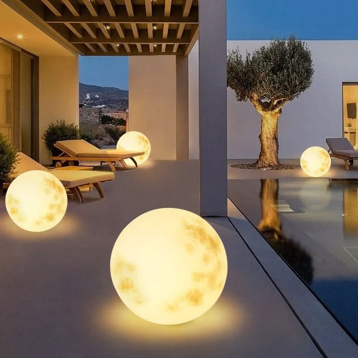 Rechargeable moon lamp for garden decor. Outdoor LED light, creates ambient glow for patios & walkways.