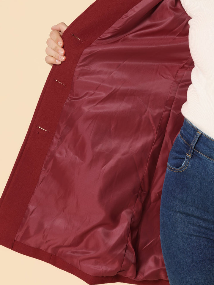 Tailored single-breasted women's trench coat, classic winter outerwear for an elegant city style.
